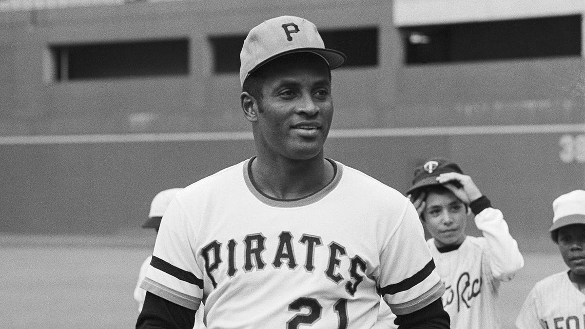 Roberto Clemente looks on