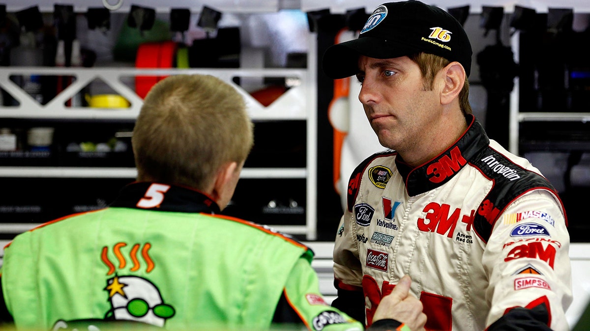 Mark Martin and Greg Biffle in the garage