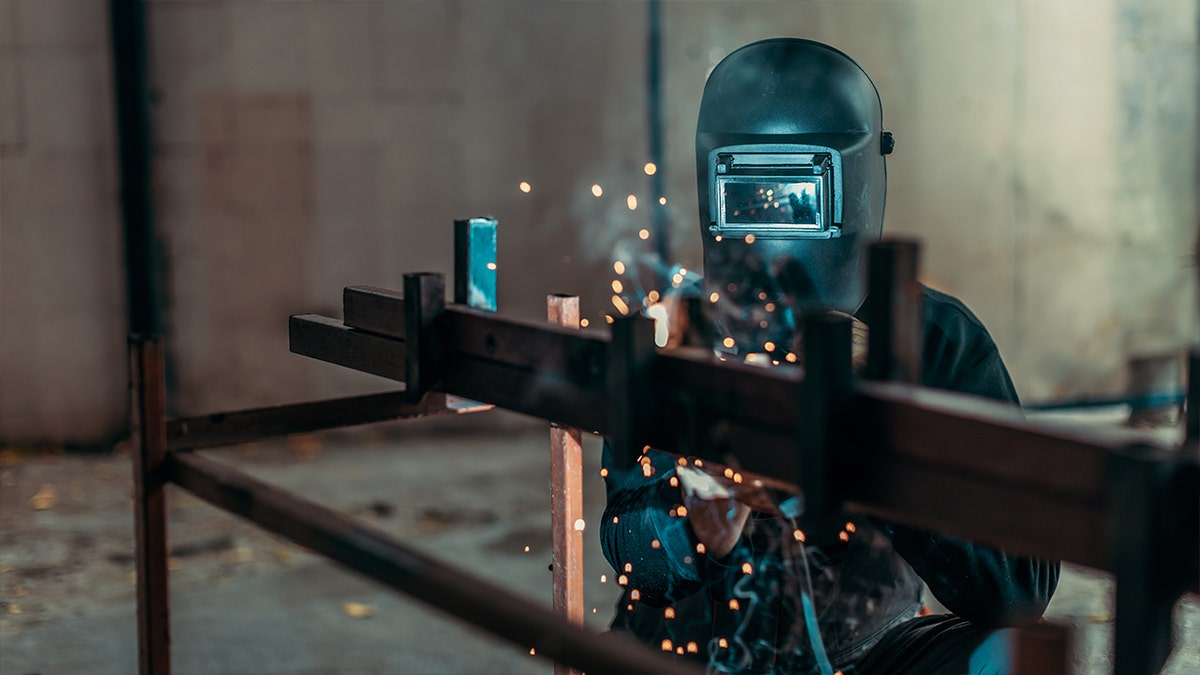 Welder with sparks