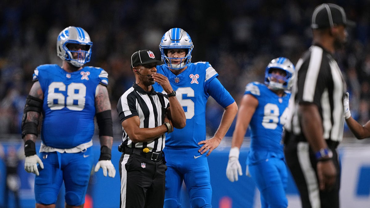 Lions players wait for the call