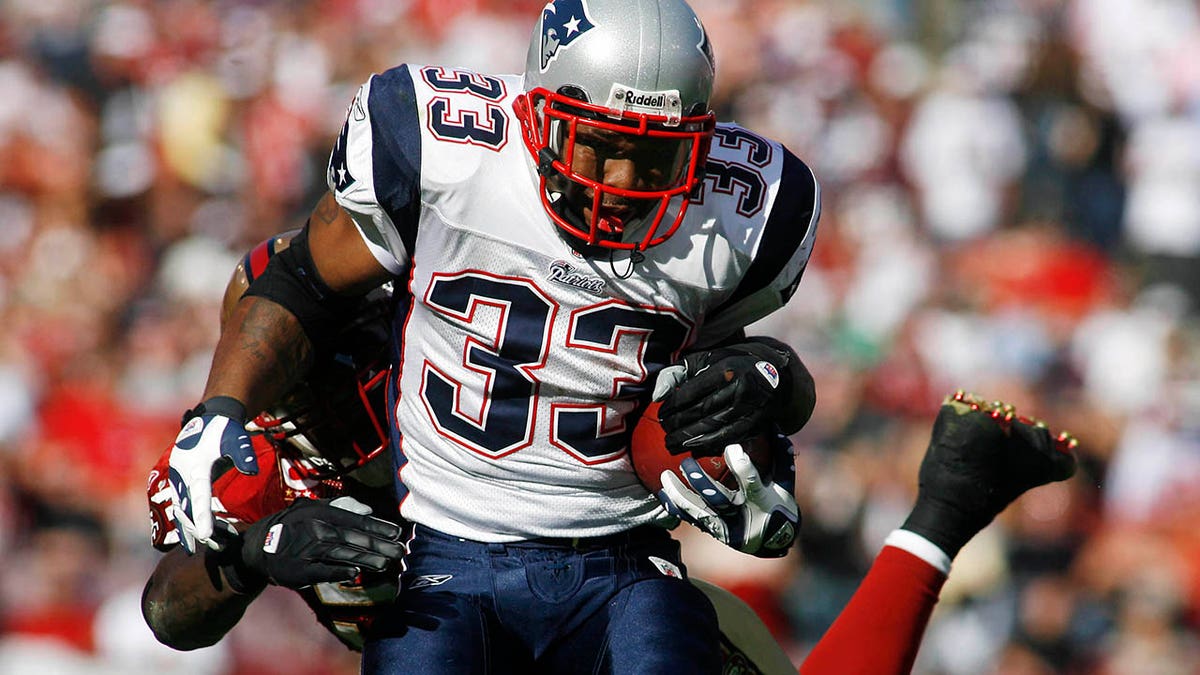 Kevin Faulk goes up against the 49ers