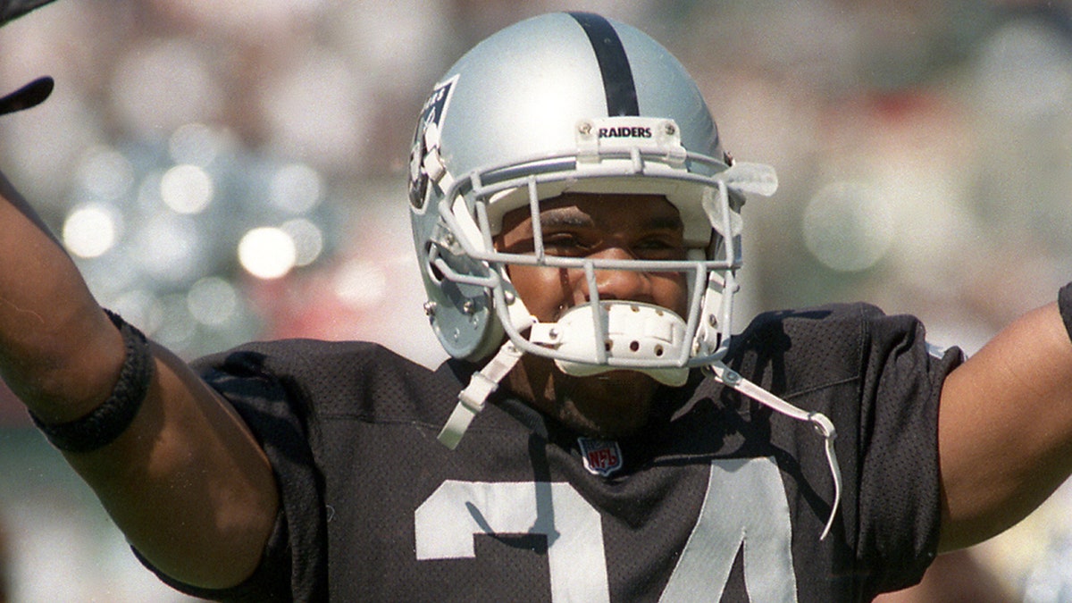 Charles Woodson faces the Broncos