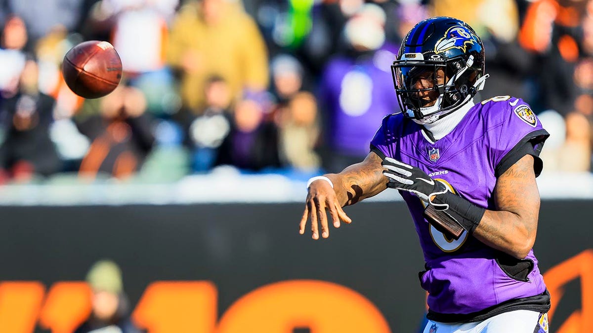 Lamar Jackson fires the ball