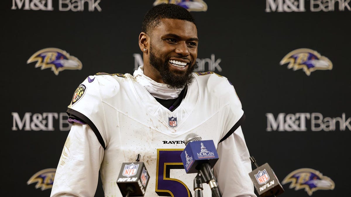 Tyler Huntley talks to reporters