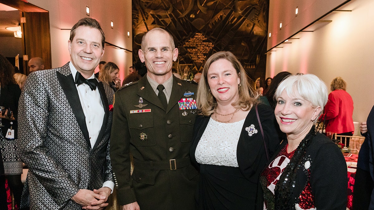 Conductor Steven Reineke and military service member at Kennedy Center