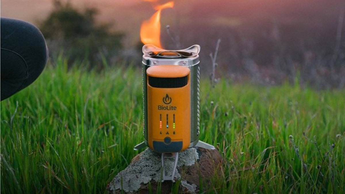 Keep warm, cook food and charge your devices on this portable stove.