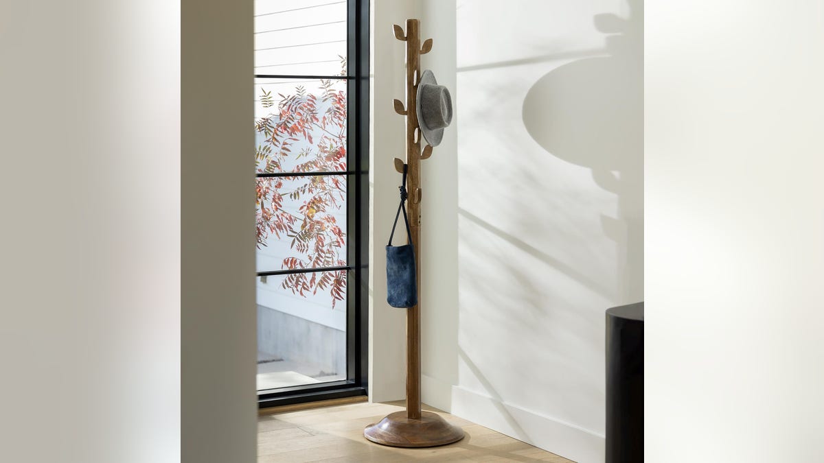 Sturdy and stylish, this tree coat rack will look great in any space. 