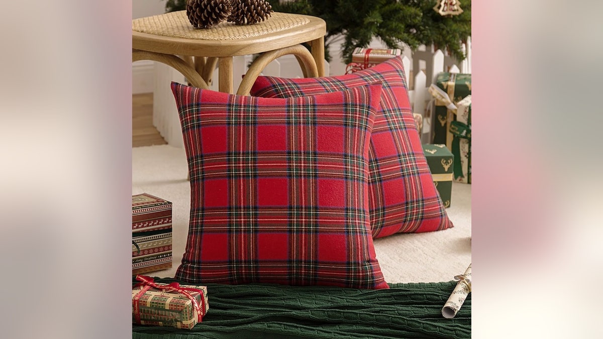 Plaid throw pillows add a vintage style to a handful of rooms in your home.