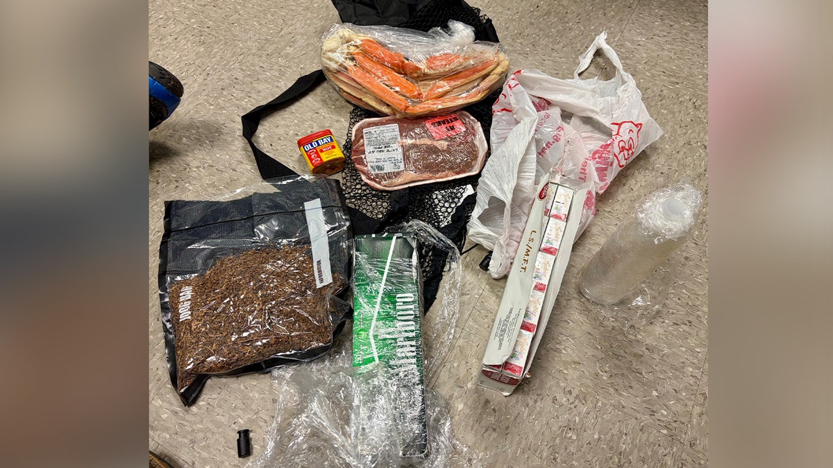 Contraband food and tobacco on floor