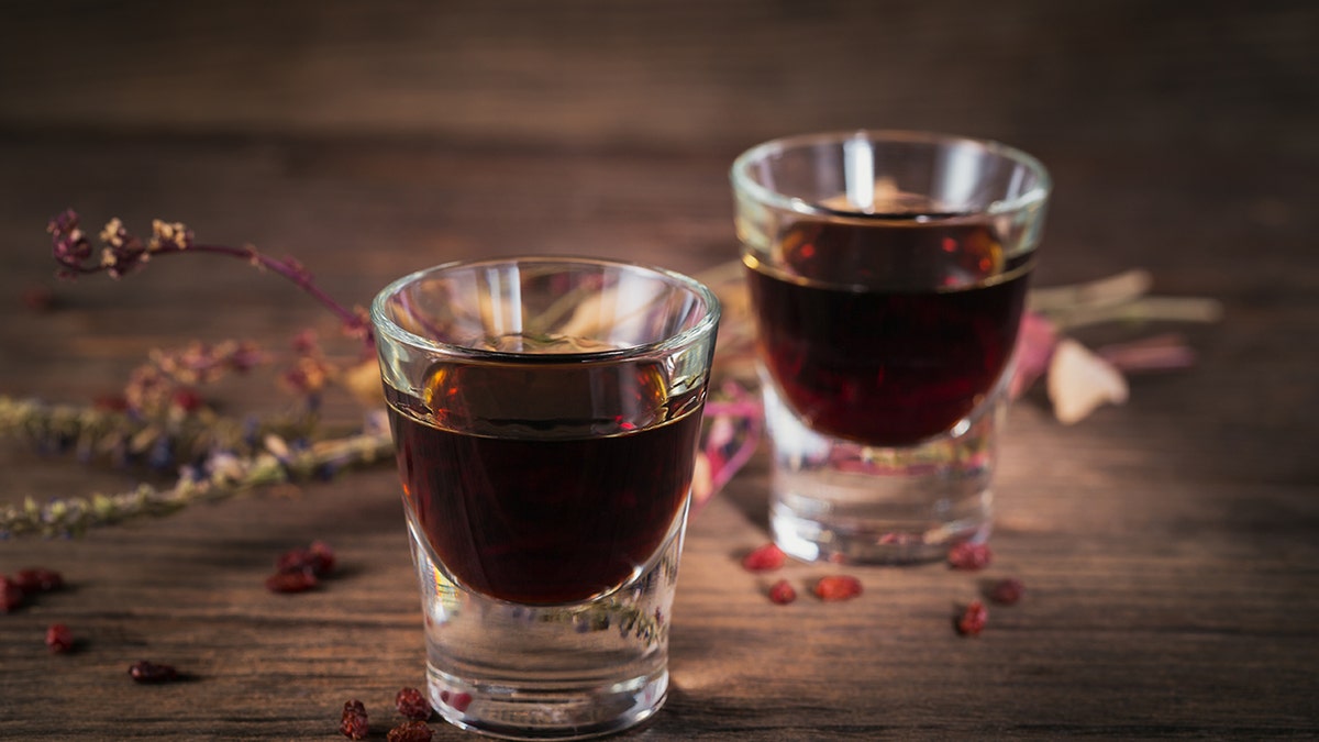 Shots of dark liquor