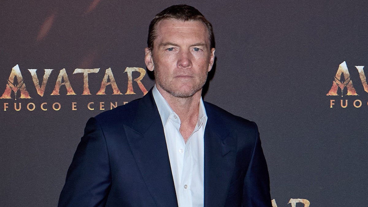 Sam Worthington at the "Avatar: Fire and Ash" premiere in Milan, Italy in December 2025.