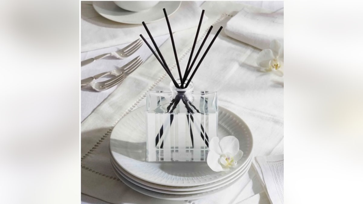 Both a thoughtful and useful gift, this reed diffuser looks chic and imparts a fresh scent.