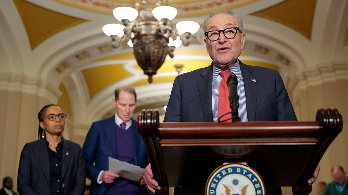 Senate Minority Leader Chuck Schumer, D-N.Y., speaks outside of the Senate chamber.