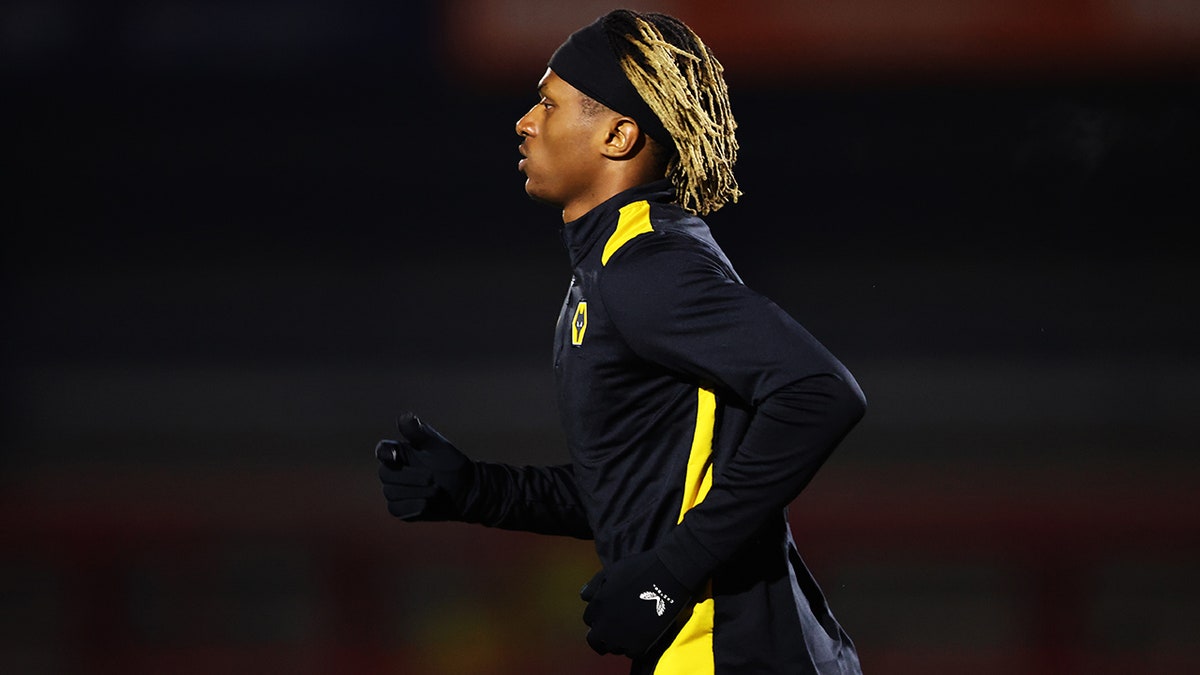 Ethan McLeod warms up