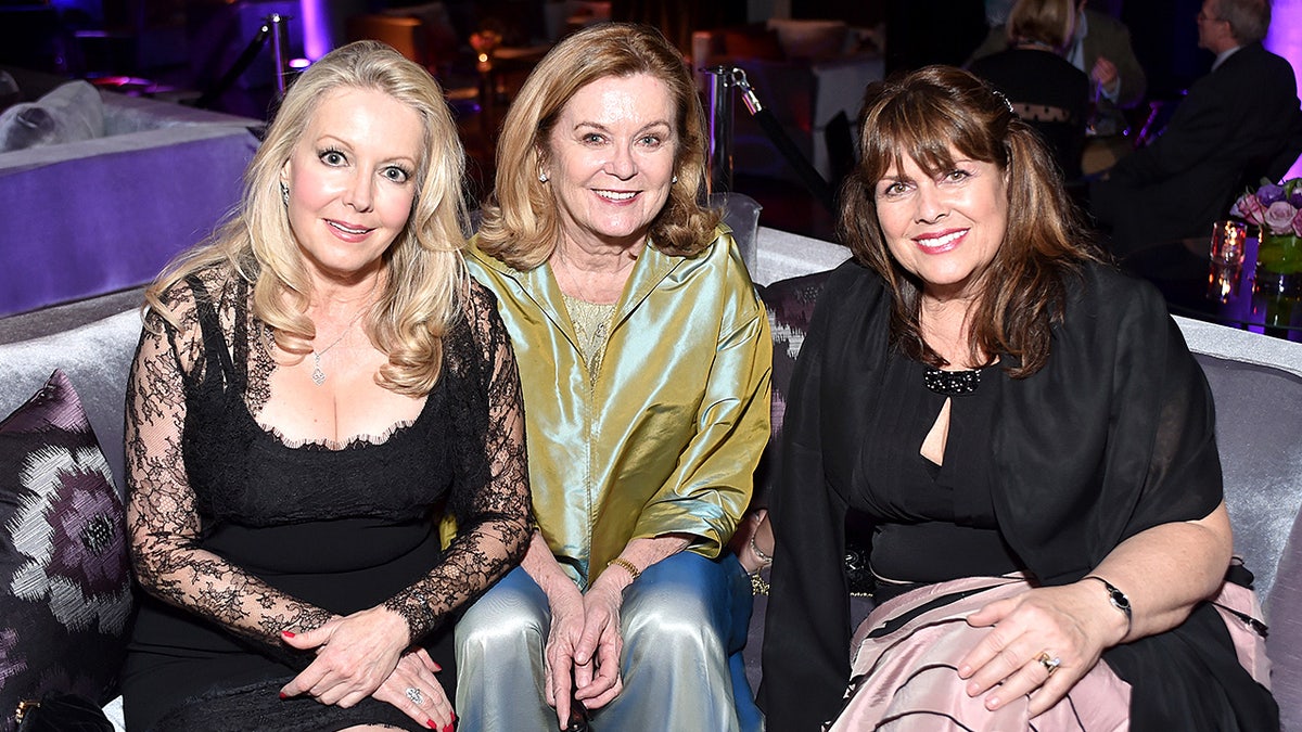 Actresses Kym Karath, Heather Menzies, and Debbie Turner pose together at an after-party event.