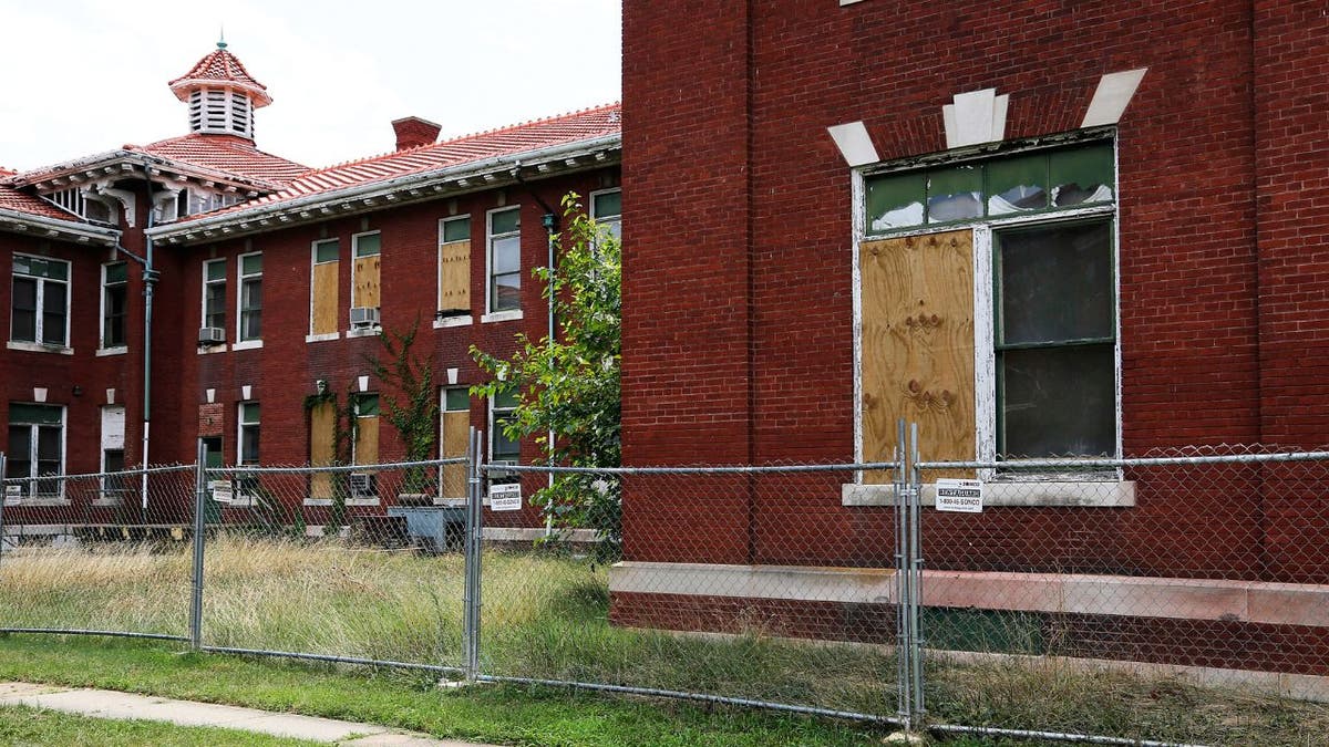 Abandoned historic brick buildings at the former St. Elizabeths Hospital campus in Washington, D.C.