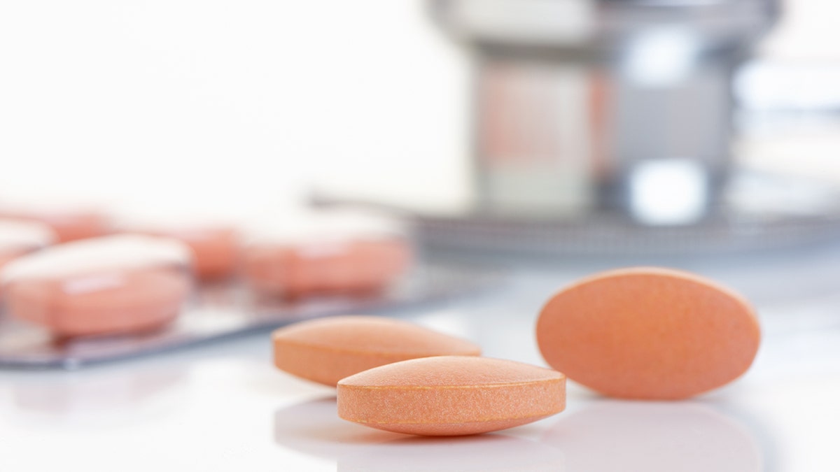 Close up of a Statin tablet - the cholesterol lowering drug.