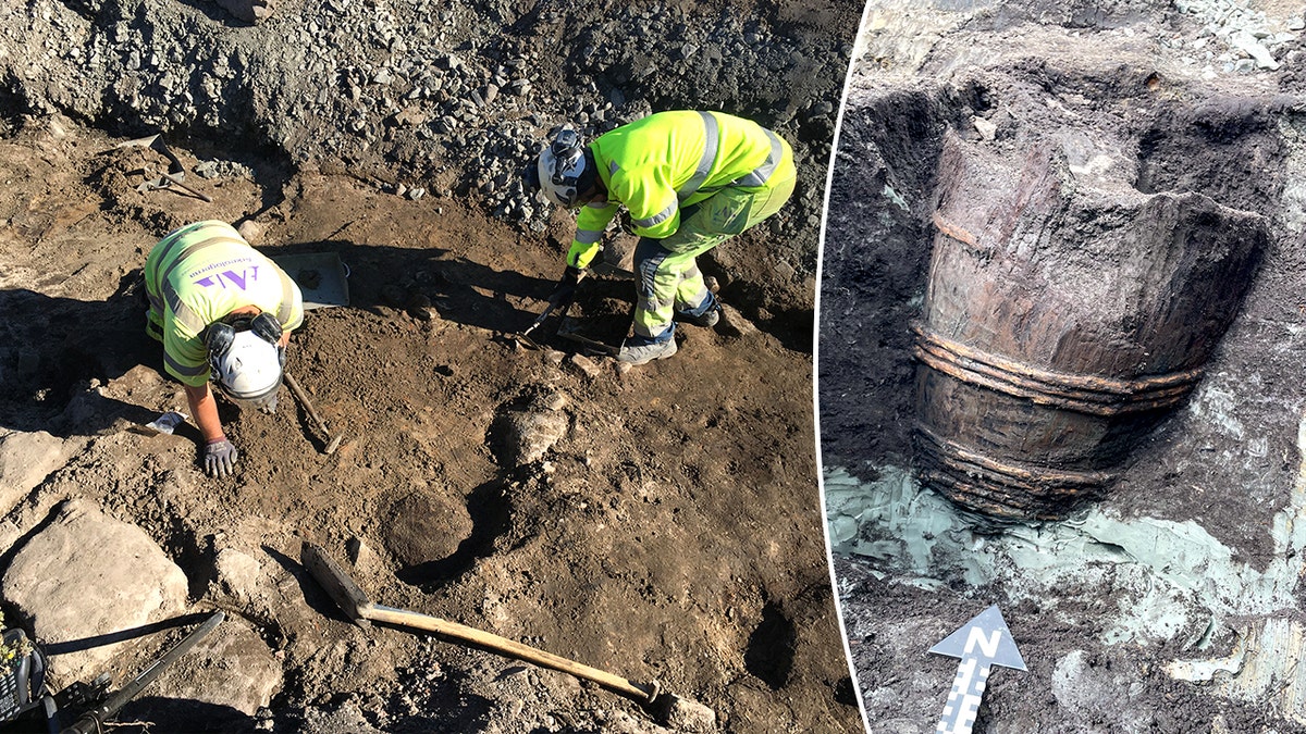 Archaeologists working at site, wooden barrel