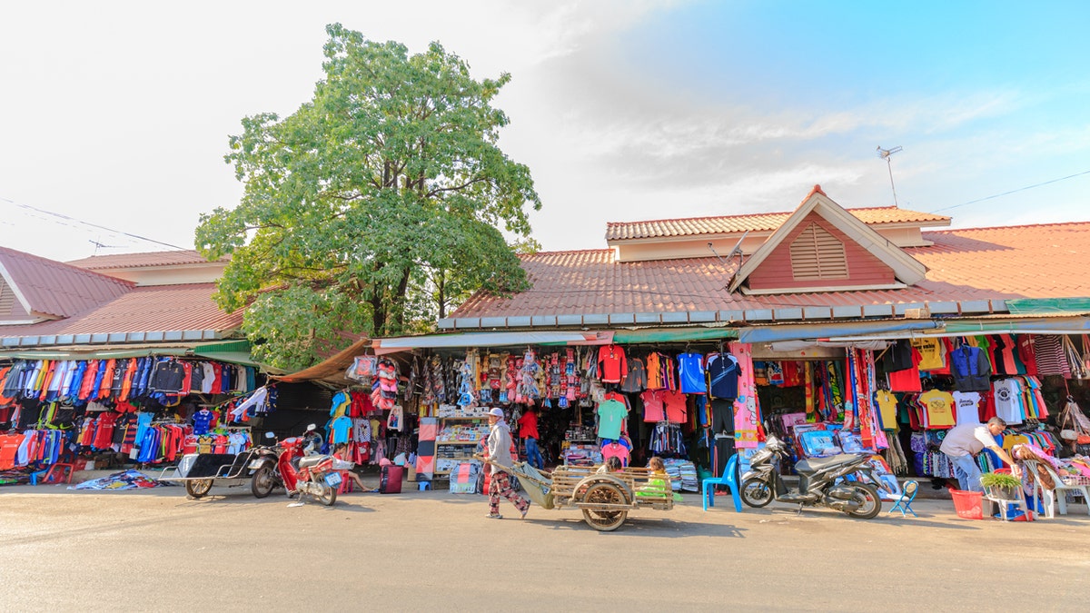 Aranyaprathet thailand outdoor market with colorful merchandise 
