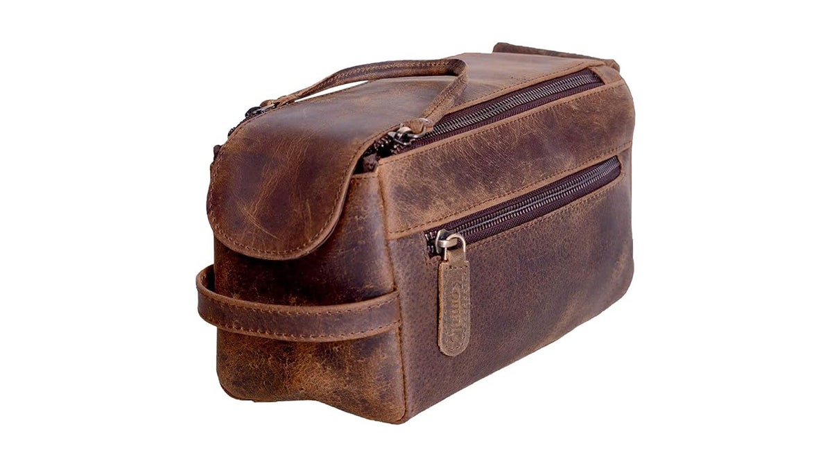 A classic buffalo leather dopp kit keeps grooming essentials in one place.