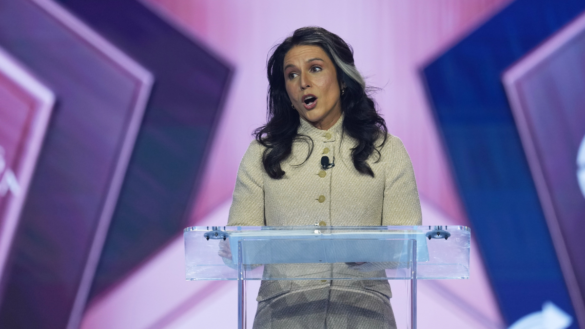 Director of National Intelligence Tulsi Gabbard speaks during Turning Point USA's AmericaFest 2025.