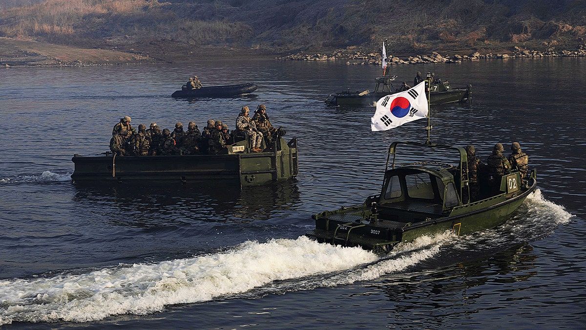 South Korean soldiers from the 5th Engineer Brigade and US soldiers from the 11th Engineer Battalion and 2nd Infantry Combined Division participate in the joint river-crossing exercise conducted for South Korean and US soldiers in Yeoncheon, Gyeonggi province, South Korea, 20 March 2024.