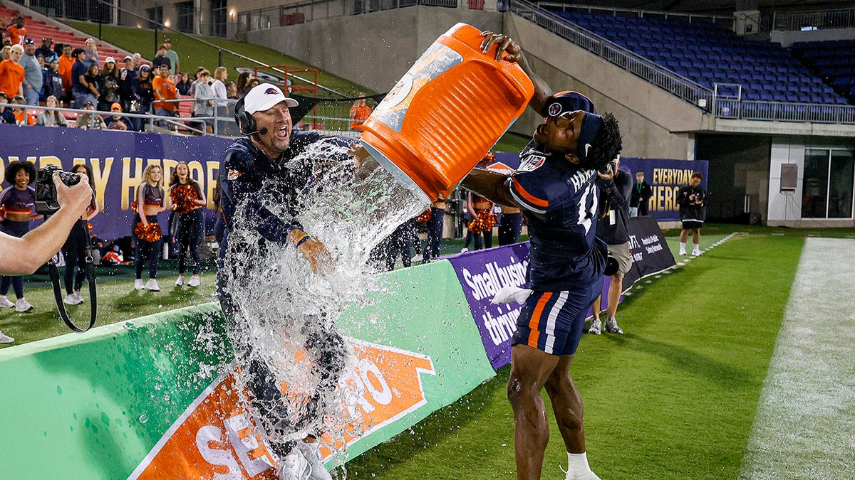 Jeff Traylor gets drenched
