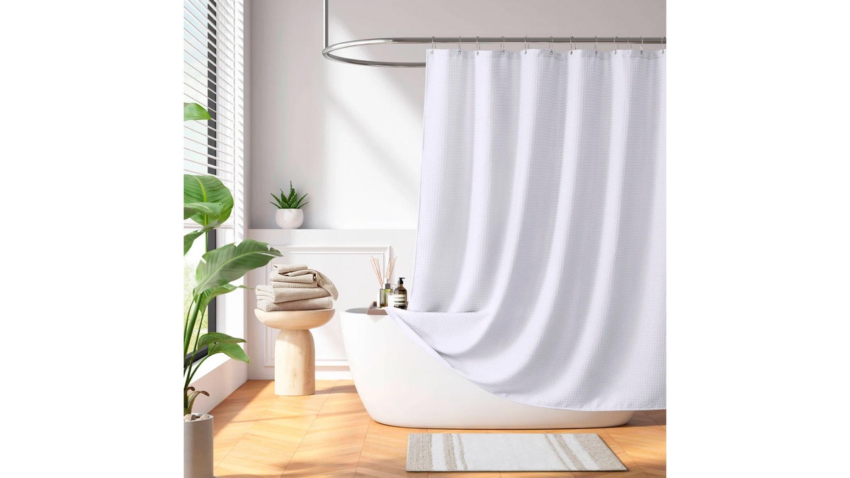 A waffle weave shower curtain adds texture to your space. 