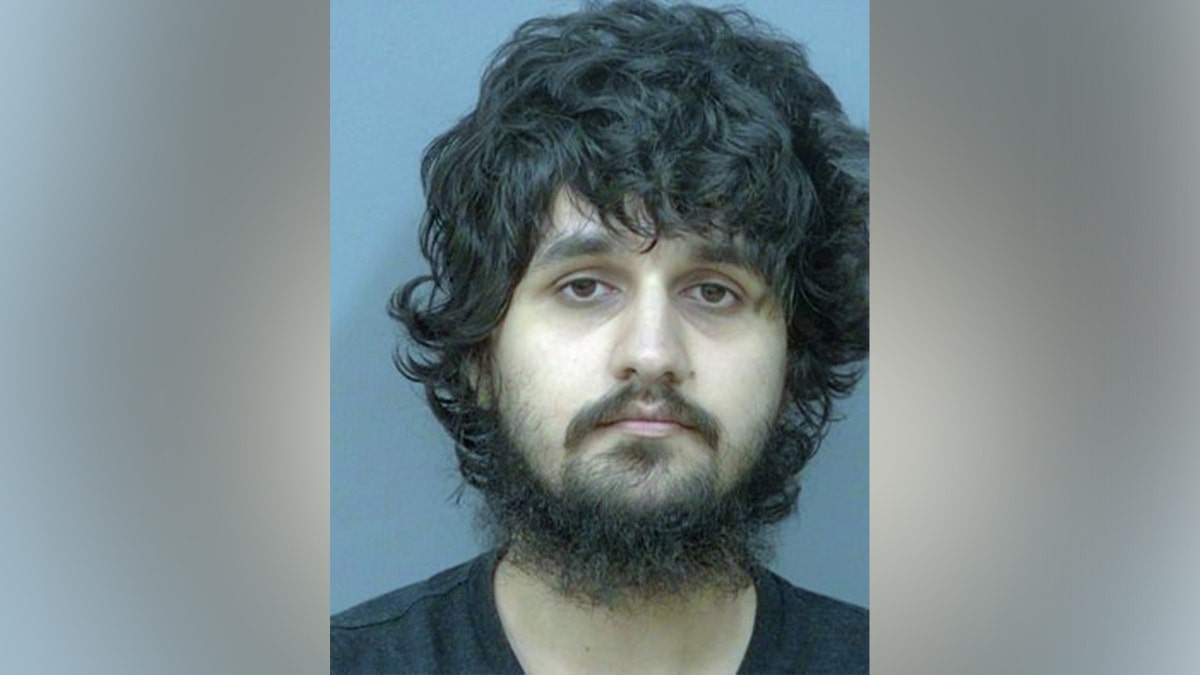 A mugshot of Waleed Khan