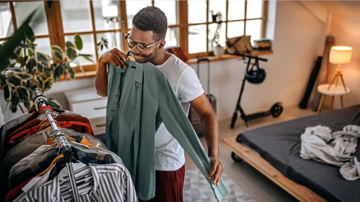 A classic crewneck T-shirt paired with jeans creates a timeless, versatile look.