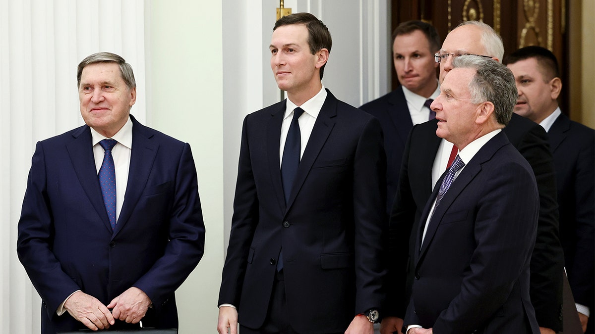 Delegates from the U.S. and Russia walk together inside the Kremlin ahead of a high-level meeting.
