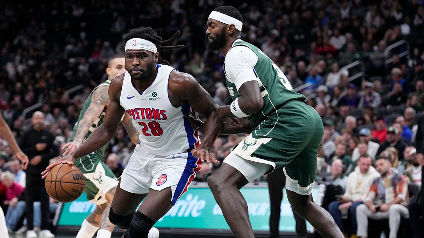 Pistons player holds up fist to opponent during heated skirmish