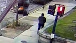 Authorities late Saturday released surveillance footage of a person of interest who is still at large following a deadly shooting at Brown University in Providence, Rhode Island.