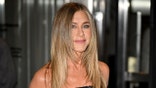 Jennifer Aniston smiling and looking forward