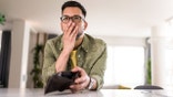 Man checking wallet