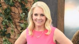 Melissa Joan Hart poses for a photo in a pink dress at "How to Train Your Dragon" premiere