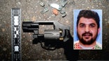 The .357 Smith & Wesson revolver used by suspect Rahmanullah Lakanwal displayed on a white surface