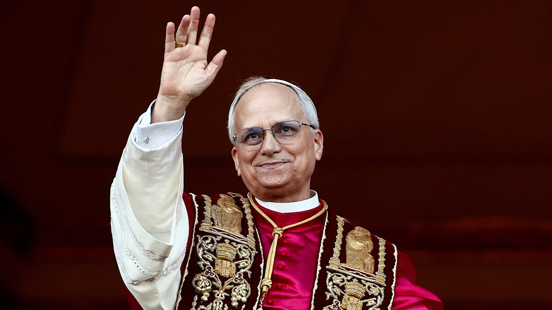 Pope Leo XIV waves after being elected