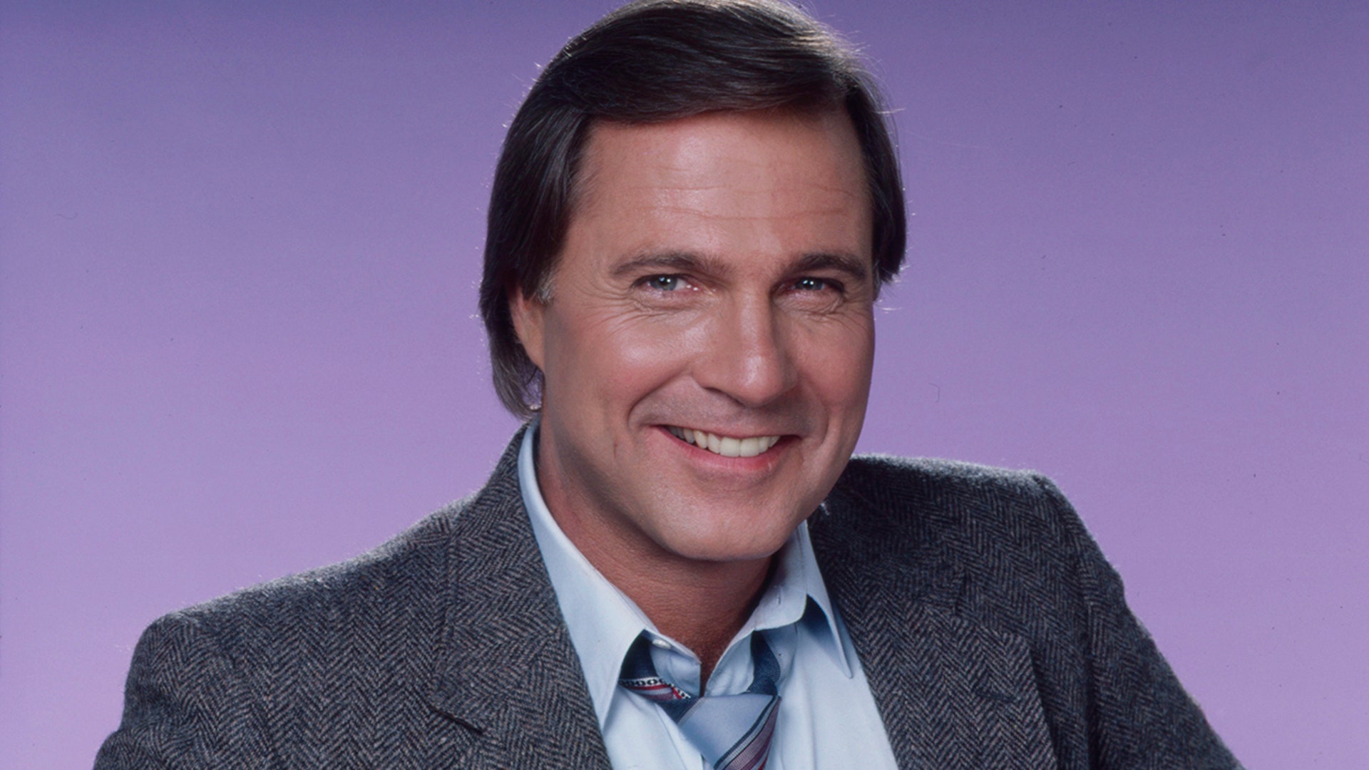 Gil Gerard poses in a promotional photo for the 1986 ABC television series Sidekicks, photographed in Los Angeles, California.