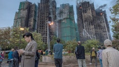 Hong Kong leader says 'we must uncover the truth' after deadly apartment fire, calls for building reform