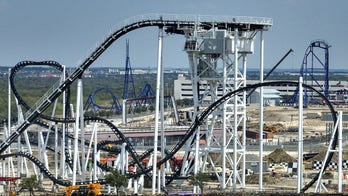 Two riders trapped more than 100 feet in air after Texas roller coaster malfunctions