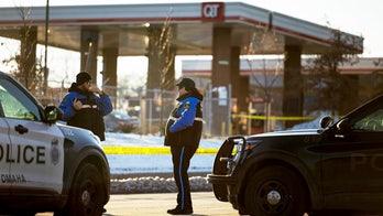Omaha bystander flees gas station bathroom moments before armed man fires on officers