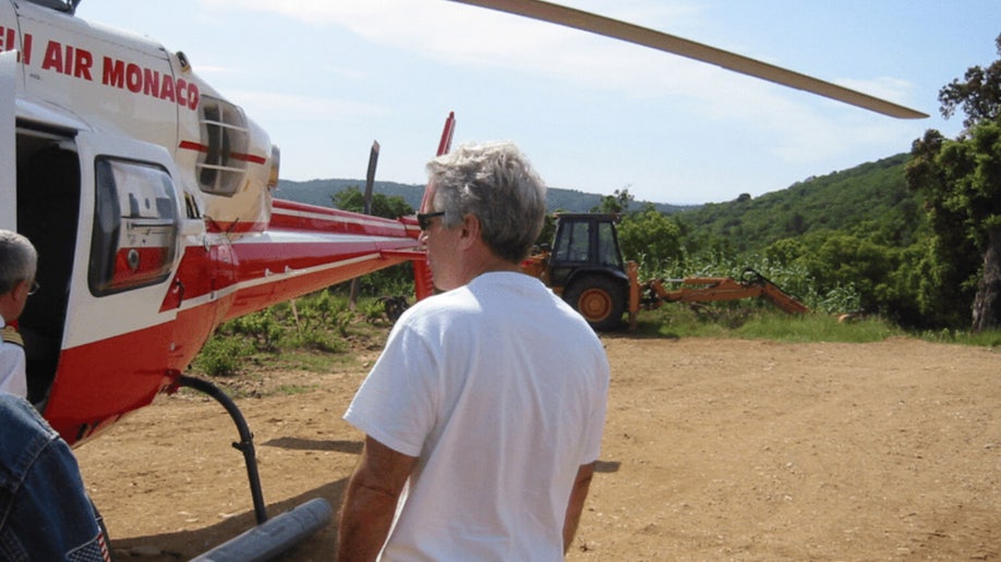 Epstein near helicopter