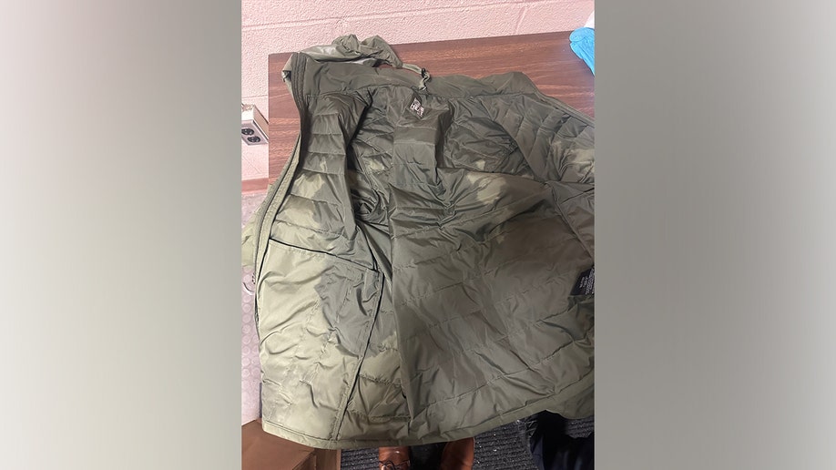 Evidence photos of Luigi Mangione's greenish  overgarment   from the apprehension  for UnitedHealthcare CEO Brian Thompson murder