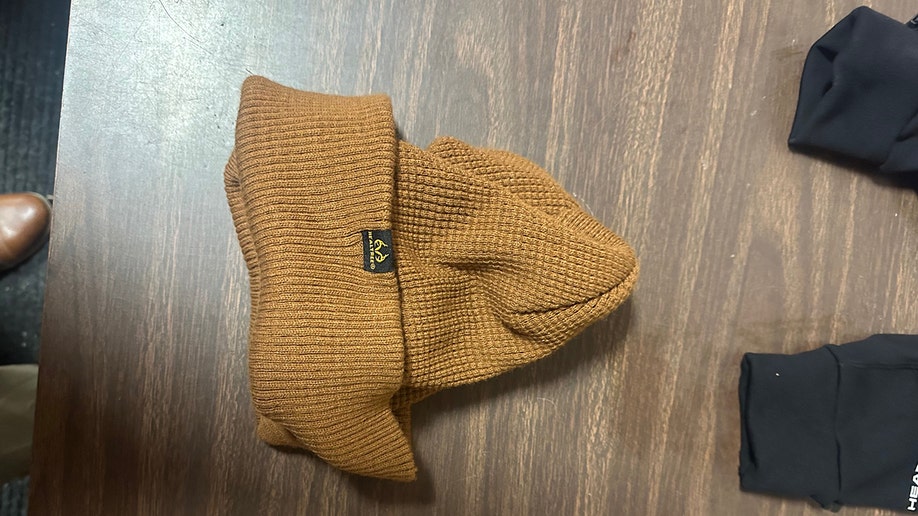 Evidence photos of Luigi Mangione's beanie from the apprehension  for UnitedHealthcare CEO Brian Thompson murder
