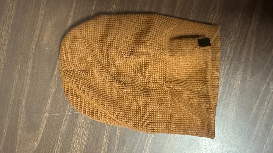 Evidence photos of Luigi Mangione's beanie from the apprehension  for UnitedHealthcare CEO Brian Thompson murder