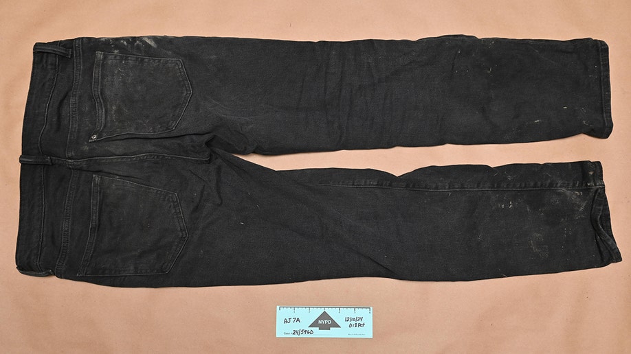 Evidence photos of Luigi Mangione's achromatic  pants from the apprehension  for UnitedHealthcare CEO Brian Thompson murder