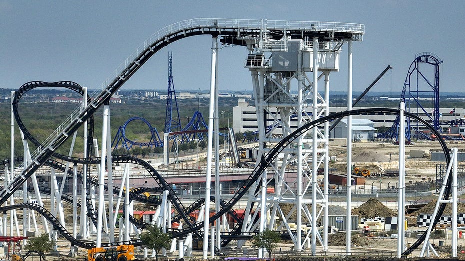 Two riders trapped more than 100 feet in air after Texas roller coaster malfunctions