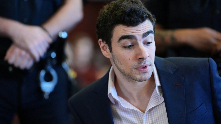 Luigi Mangione said 'all these people are here for a mass murder, wild' at arraignment: police officer