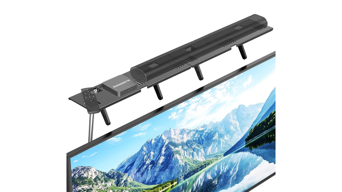 Store speakers, the remote and more on this shelf. 